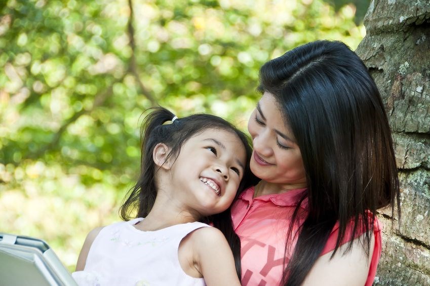 Mother and daughter enjoying their tablet PC