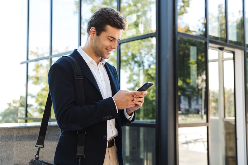 A man checking something on his smartphone.