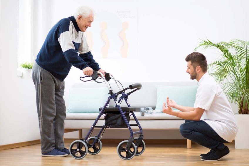 A man using a rollator walker.